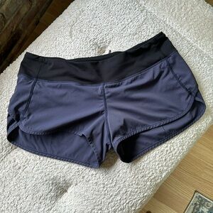 lululemon speed up shorts navy blue/black. like new